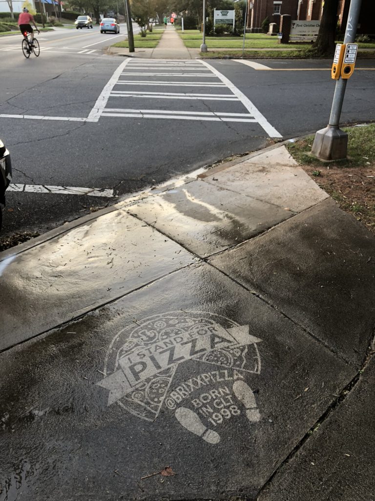 Clean Graffiti for Brixx Pizza on the street corner.