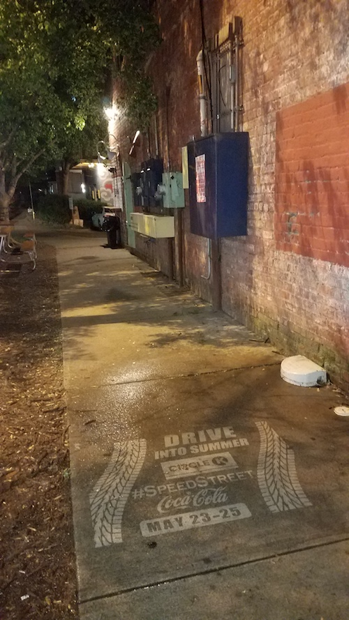 Sidewalk messaging in a popular , artsy neighborhood