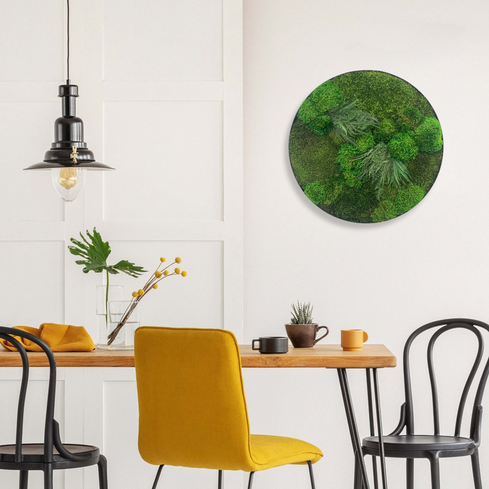 The Savage Way Fern circle hanging in a modern, colorful dining room.