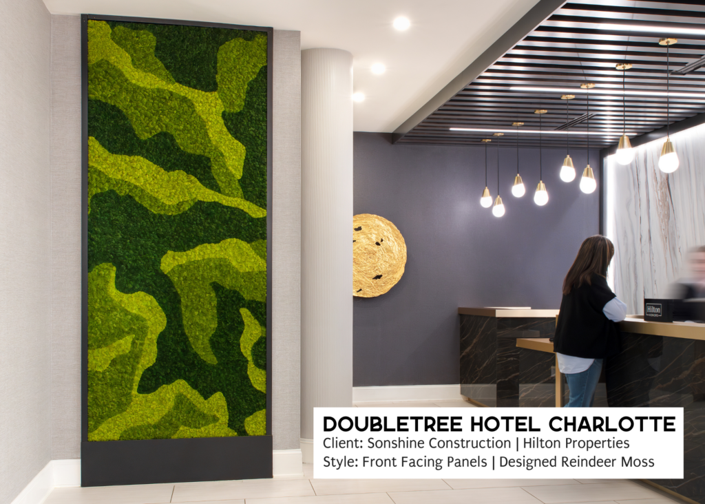 Biophilic Design using a green wall of Moss Art by The Savage Way at Doubletree Hotel Charlotte a Hilton Property. 